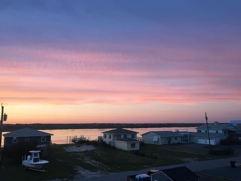 Sunset off back balcony that was just redone so brand new (April 2021)- beautiful sound views and easy access