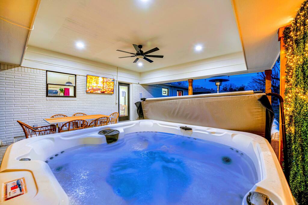 Soak in our 65 jet hot tub right in front of large TV. Best of both worlds :)