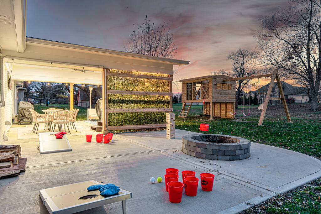 Play bucket golf, yard pong, corn hole in our large backyard 