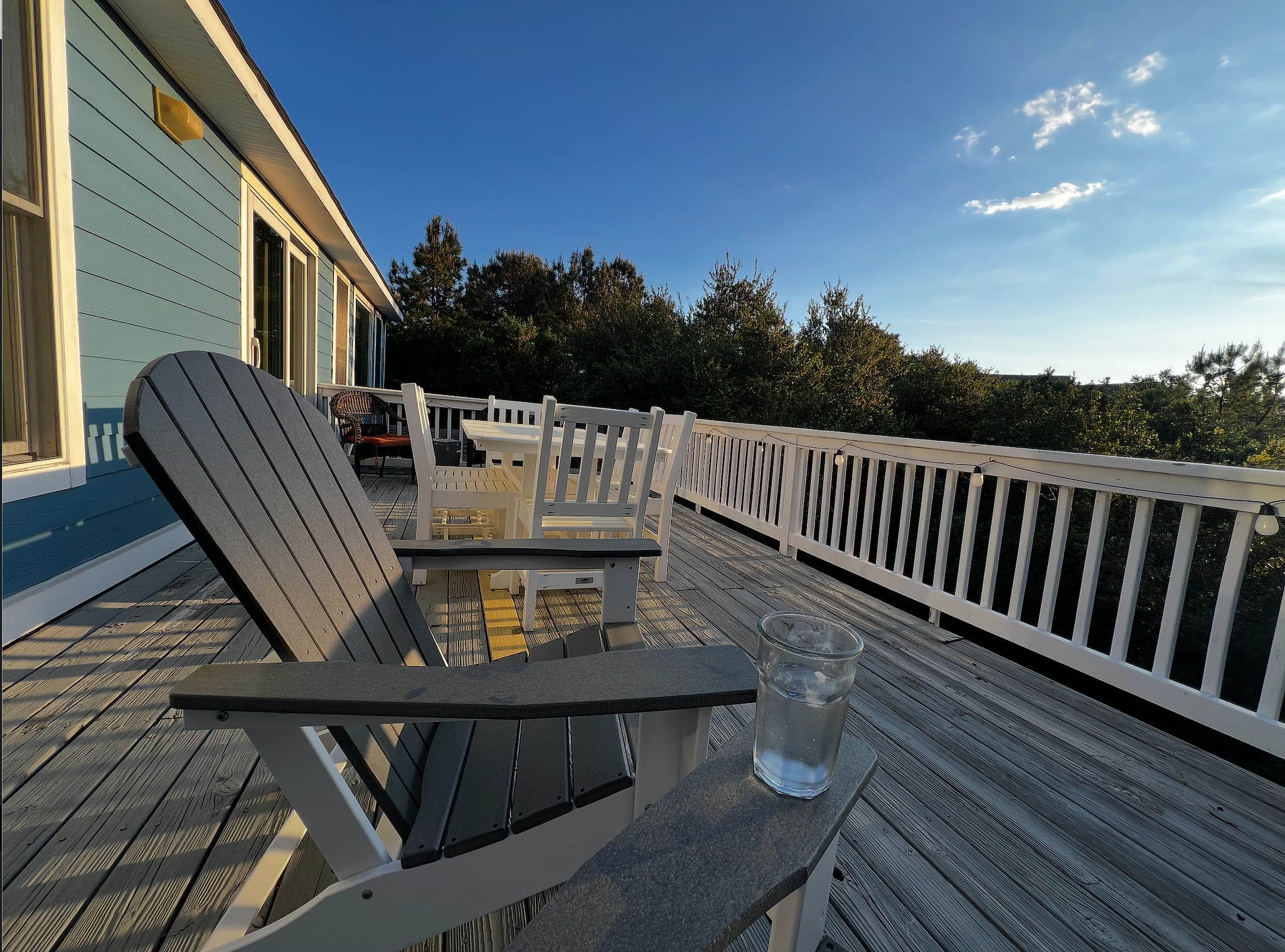 Bask in the Sunset Views from the top deck along with plenty of. chairs for the family to sit on Sounds Delightful OBX