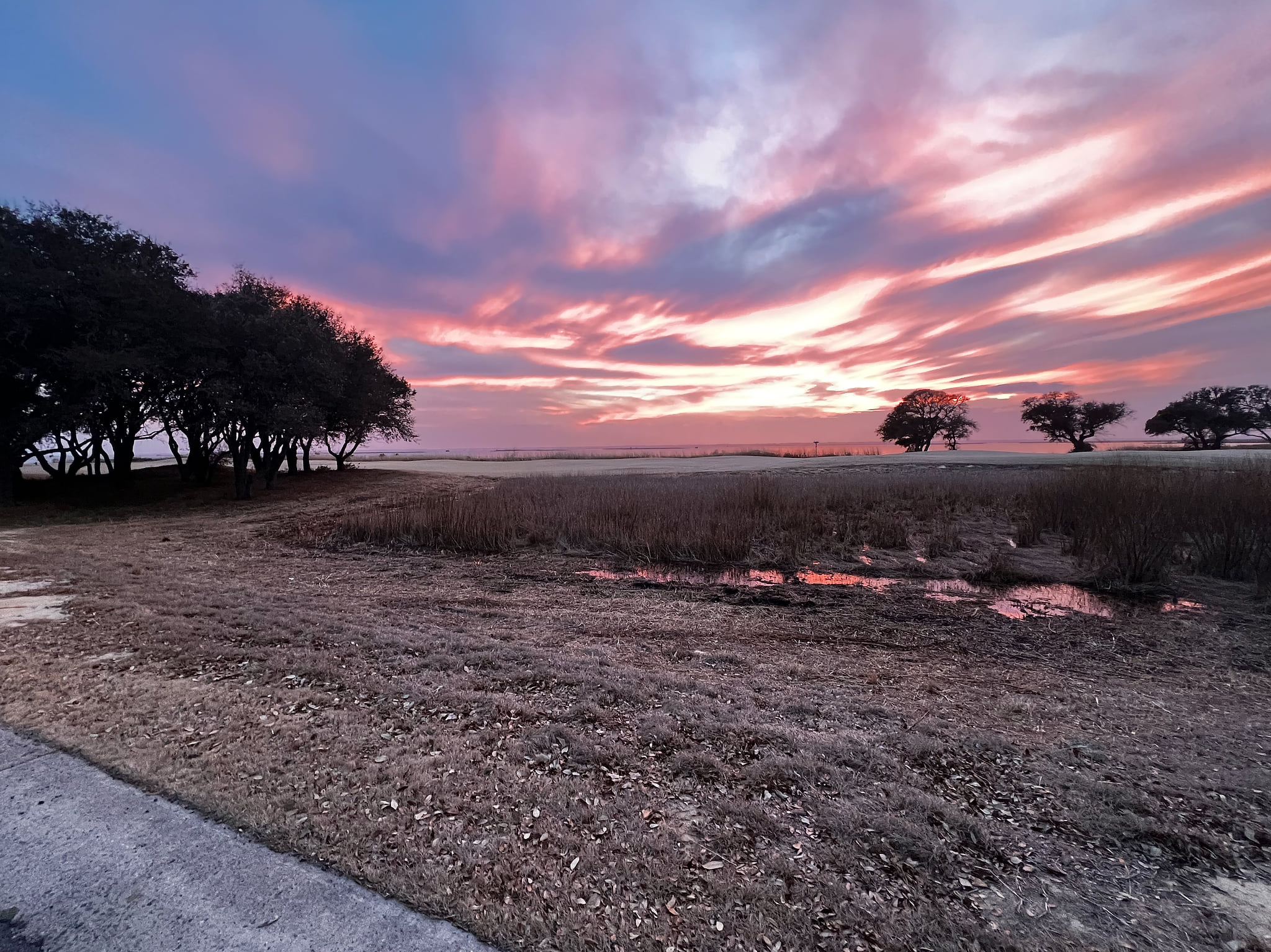 View of Sound from Hunt Club Drive gives amazing sunset views of the water ( Sound Side) this photos has not been edited. It is a real colorful view :) 