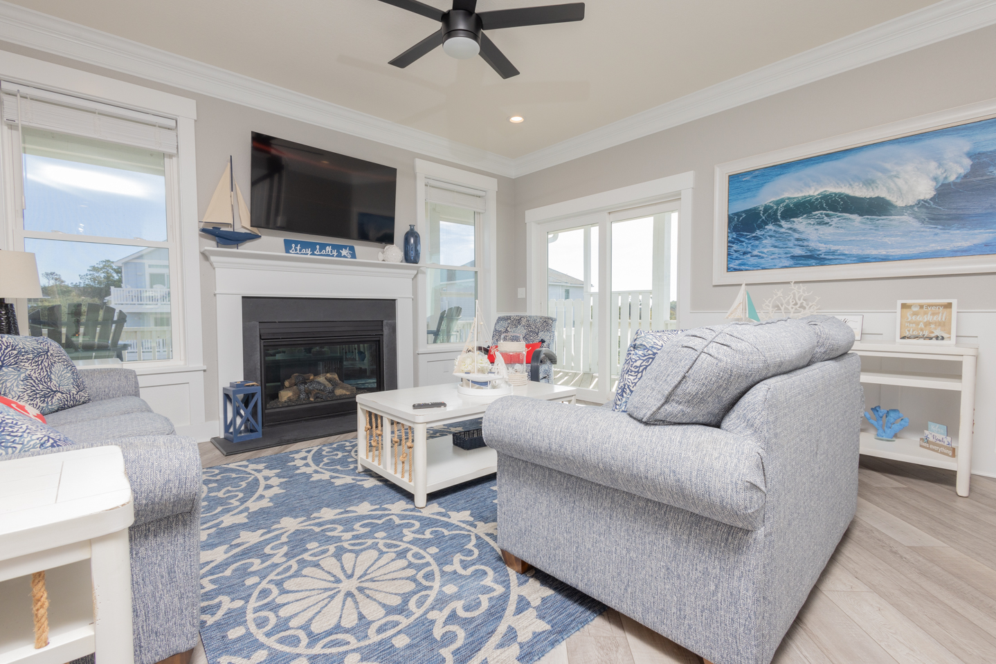 Gather in the roomy Living Space with Cozy Fireplace.