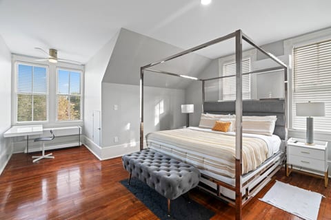 The master bedroom with an en-suite bathroom and a dedicated workspace. We provide ultra-comfortable mattresses and luxurious linens.