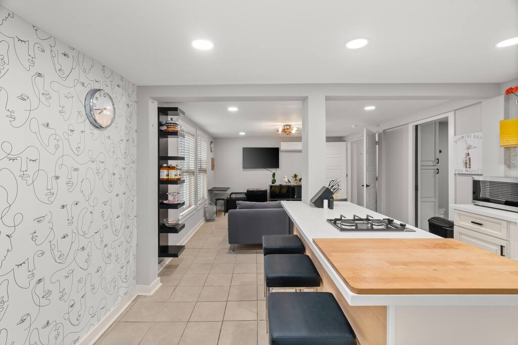 The kitchen island has large comfortable seats to hang out with your laptop on or enjoy a meal together! 