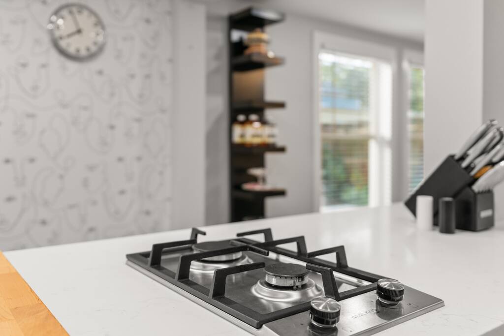 The stove is a two-burner gas stovetop with plenty of space for a saucepan and a frying pan to multitask your food prep! 