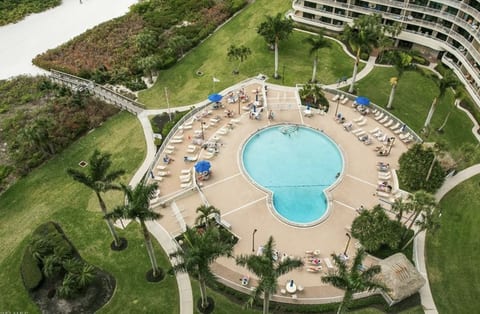 View of the large pool and sundeck from the balcony