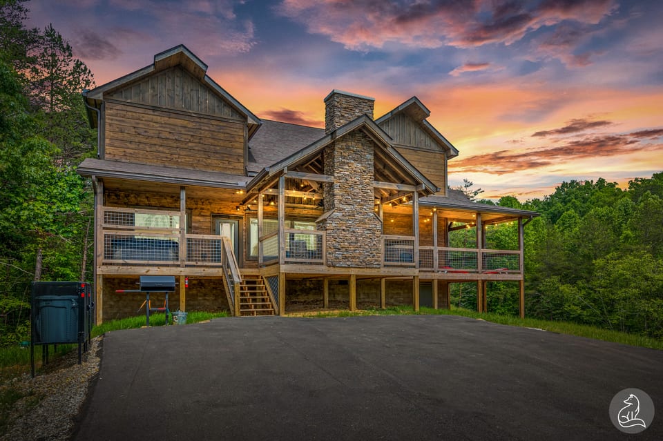 Experience ultimate luxury and entertainment at this hilltop retreat with an indoor pool, game room, theater, and hot tub, all on 3 private acres in a gated community.