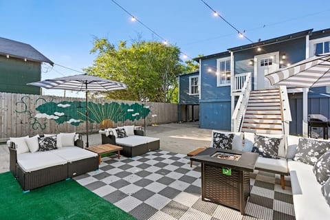 Courtyard area with mural and fire pit.