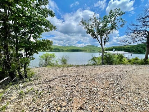 Gated Lakefront Acreage w/ Views and Beach Access