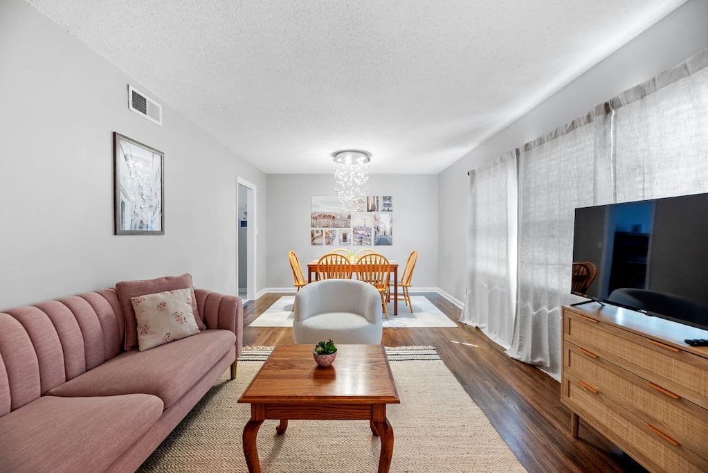 Hang out in the living area with seating for four by the tv or have a meal together!