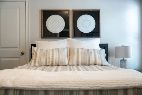 Cozy bedroom with spacious bed, perfect for a relaxing getaway