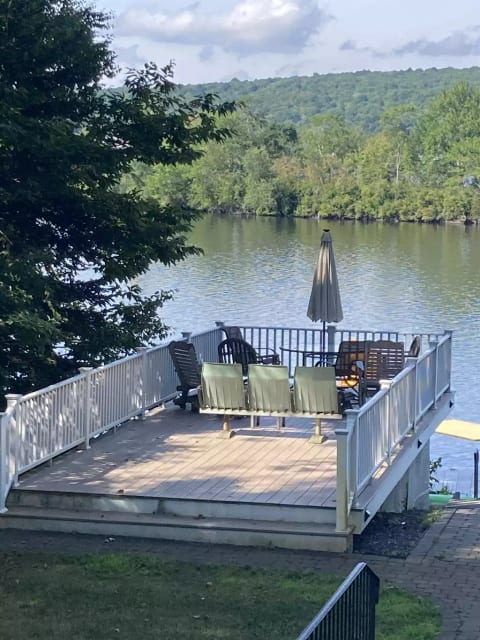 Large sunny deck with plenty of seating
