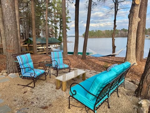 Outdoor seating area next to new 7-person hot tub.