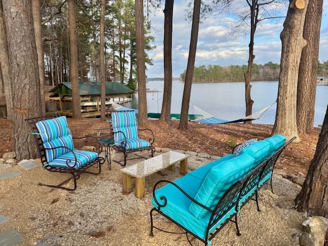 Outdoor seating area next to new 7-person hot tub.