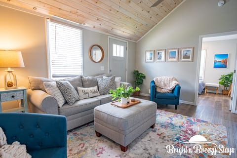 Open living area with plenty of seating.  Couch pulls out to a queen bed.