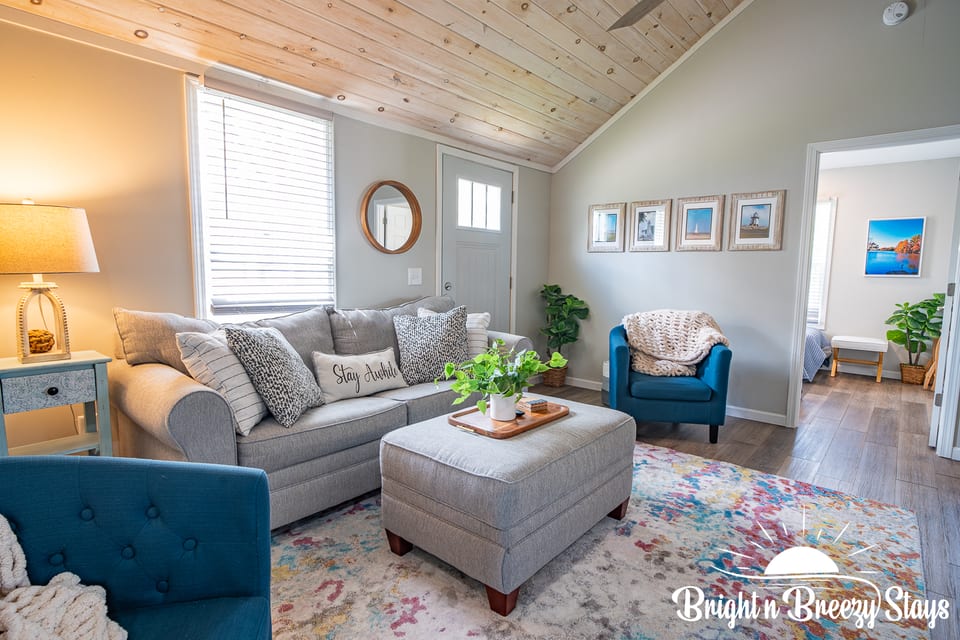 Open living area with plenty of seating.  Couch pulls out to a queen bed.