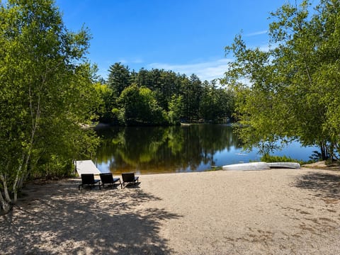 The beach with lounging chairs. Nice and sandy and gradual decline (perfect for kids)