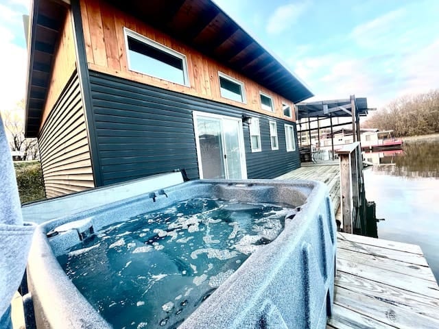 Outdoor patio and hot tub.