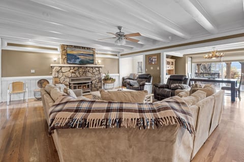 Spacious dining area w/ rustic touches, perfect for shared meals & lingering conversations.