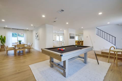 Spacious open-concept layout w/ large island, modern finishes & room to gather, cook & connect.