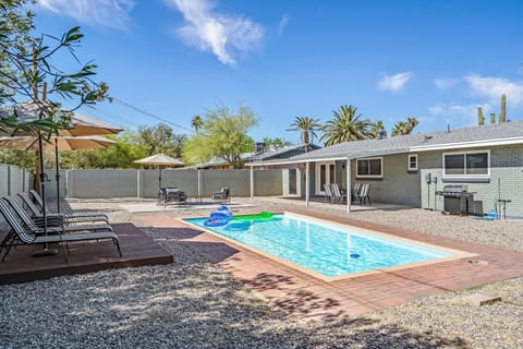 Private pool framed by desert landscaping, perfect for cooling off & soaking up the sun.