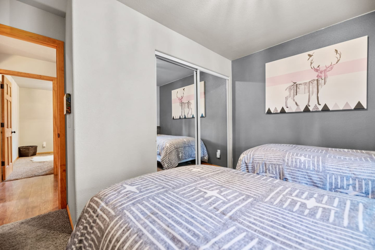 Big Bear vacation rental with hot tub and game room, close to lake, ski resorts, and trails. By Rather Be Properties