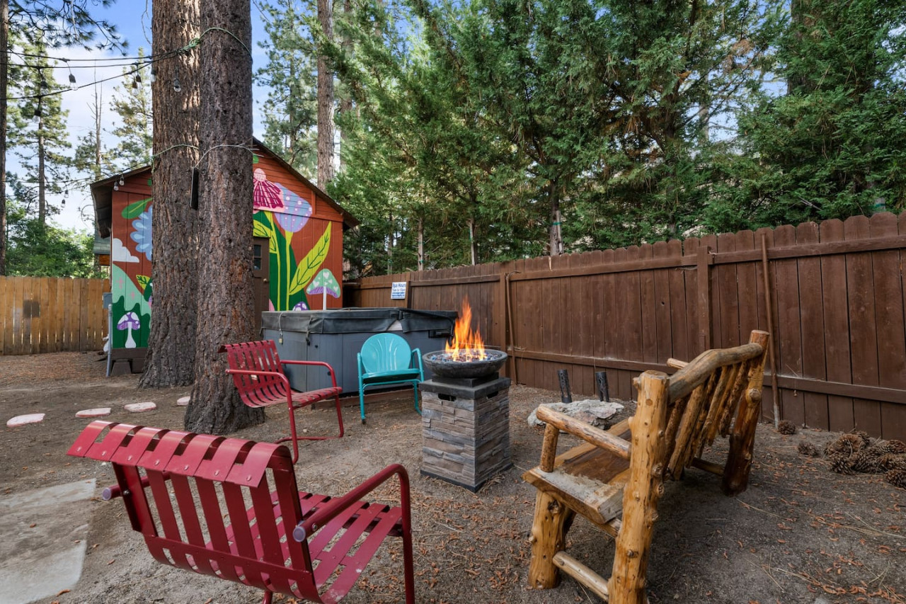 Big Bear vacation rental with hot tub and game room, close to lake, ski resorts, and trails. By Rather Be Properties