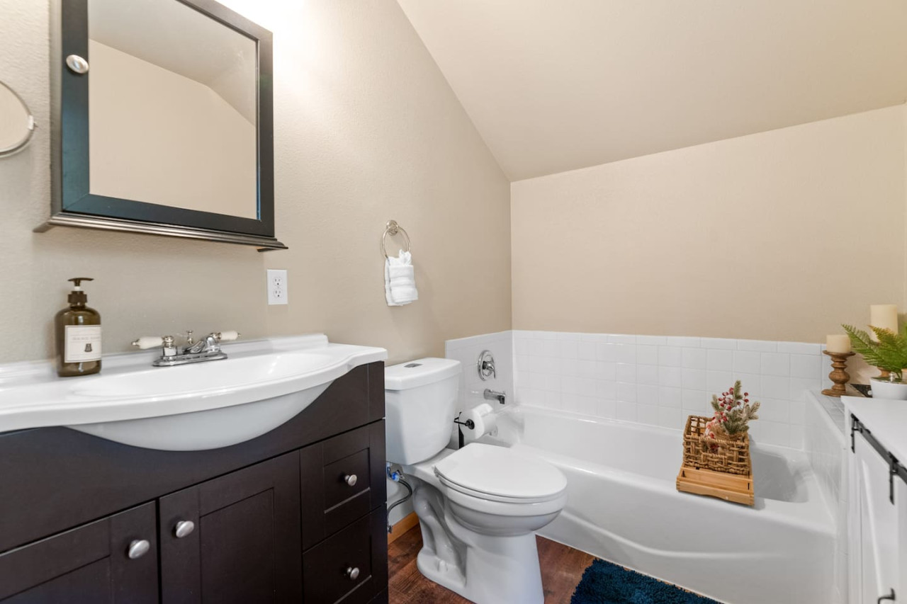 Big Bear vacation rental with hot tub and game room, close to lake, ski resorts, and trails. By Rather Be Properties