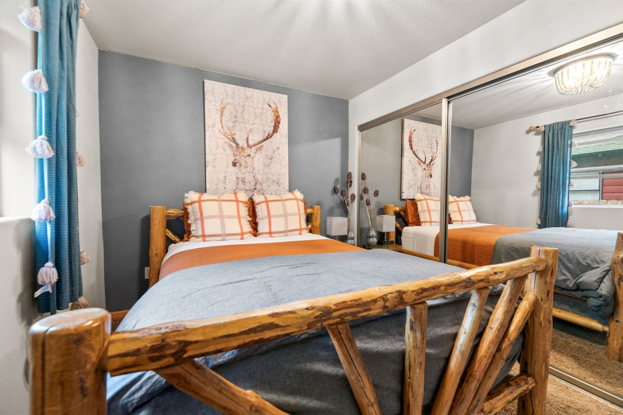 Big Bear vacation rental with hot tub and game room, close to lake, ski resorts, and trails. By Rather Be Properties