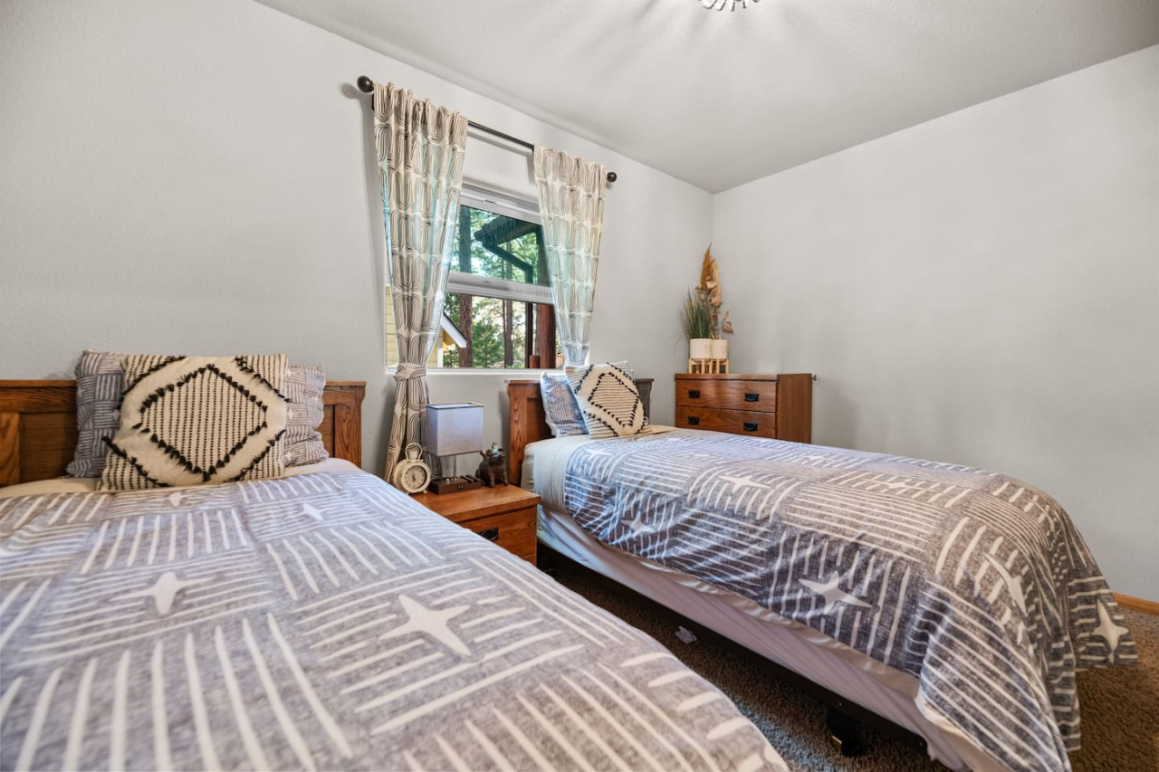 Big Bear vacation rental with hot tub and game room, close to lake, ski resorts, and trails. By Rather Be Properties