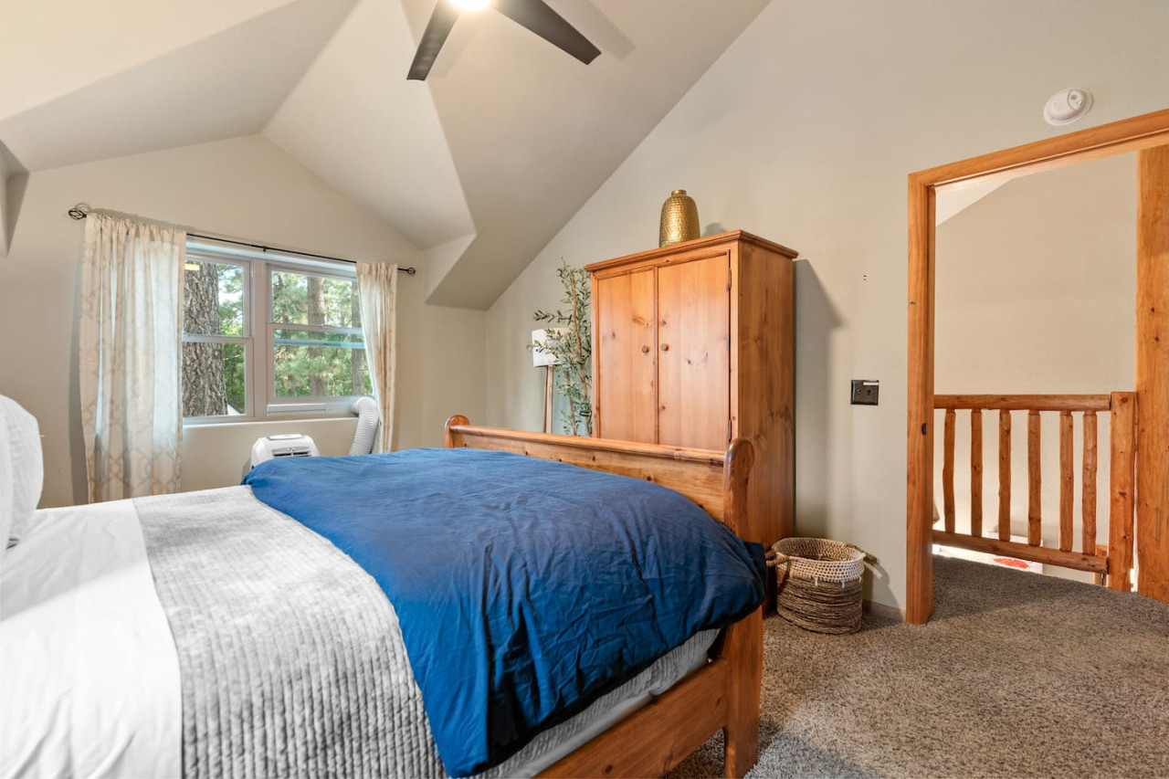 Big Bear vacation rental with hot tub and game room, close to lake, ski resorts, and trails. By Rather Be Properties