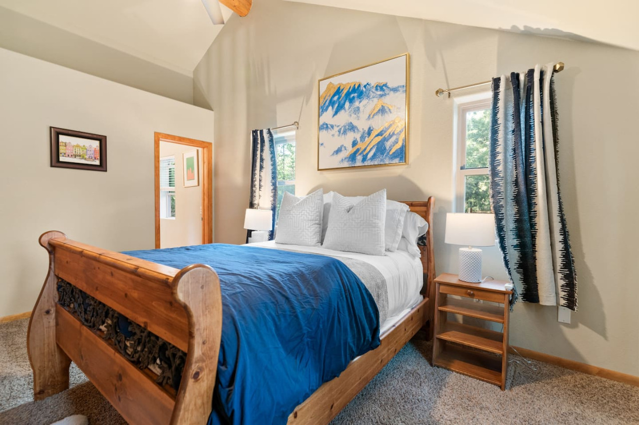 Big Bear vacation rental with hot tub and game room, close to lake, ski resorts, and trails. By Rather Be Properties