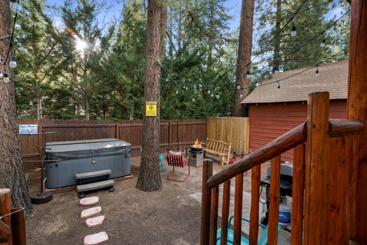 Big Bear vacation rental with hot tub and game room, close to lake, ski resorts, and trails. By Rather Be Properties