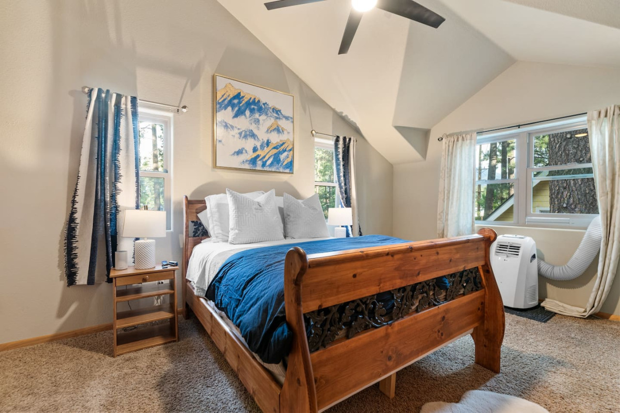 Big Bear vacation rental with hot tub and game room, close to lake, ski resorts, and trails. By Rather Be Properties