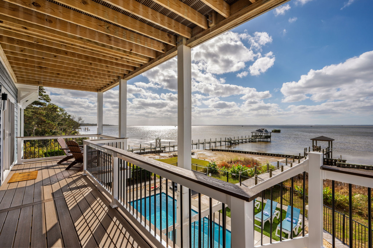 Hygge on the Bay- Luxury Water Front home with private pool, hot tub & dock by Rather Be Properties