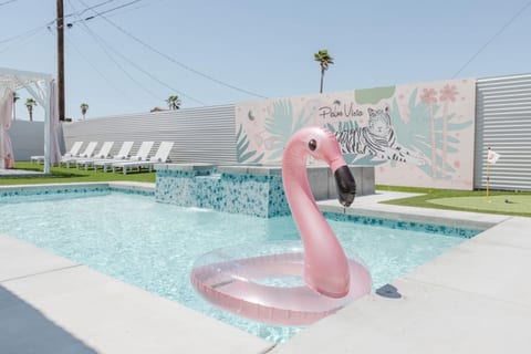 Enjoy sunny days with a side of art - our favorite tiger mural awaits you at our Palm Springs getaway!