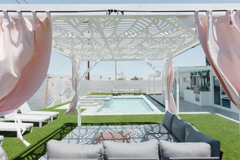 Sip on your favorite cocktail while soaking up the Palm Springs sun or cool down in the shade of our vibrant pink leaf cabana.