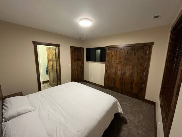 Bedroom 5: Downstairs  2nd Master Bedroom with attached full bathroom