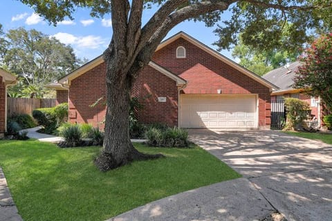 Front view of the home with Driveway and garage