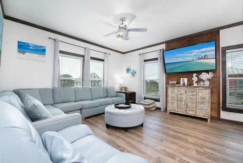 Living area with large screen smart TV