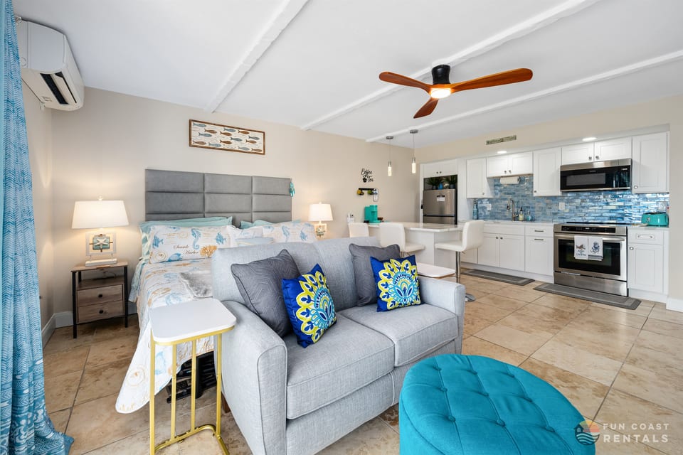 Sleeping/Living Area with Ample Seating and King Bed!