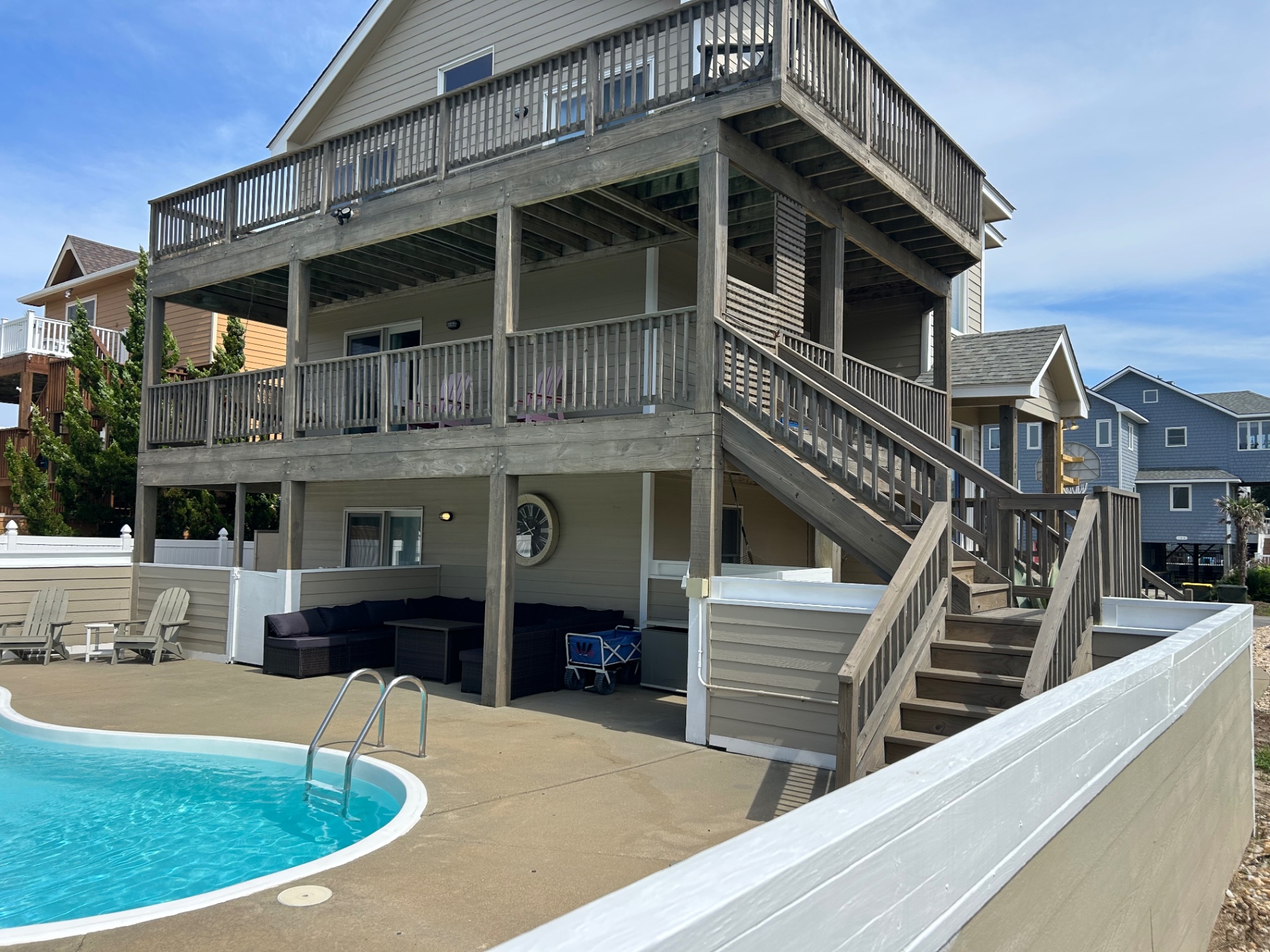 Newly stained deck and outdoor sectional 