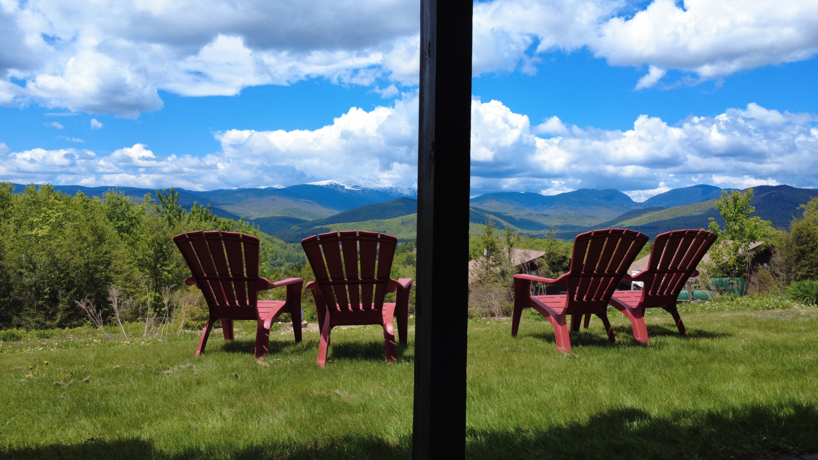 Picturesque View from inside the Living Room looking out the slider Picturesque View from inside the Living Room looking out the slider - Story Land, NH Condo - Million Dollar View of Mt Washington - Bartlett