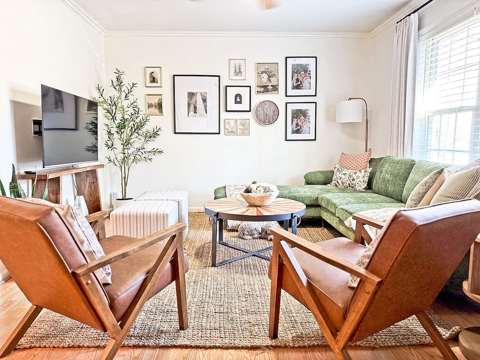 This professionally designed living space feels like home. Settle in with board games,  a vintage style record player, books, 55" smart TV and streaming apps,  and a calming space for connection.