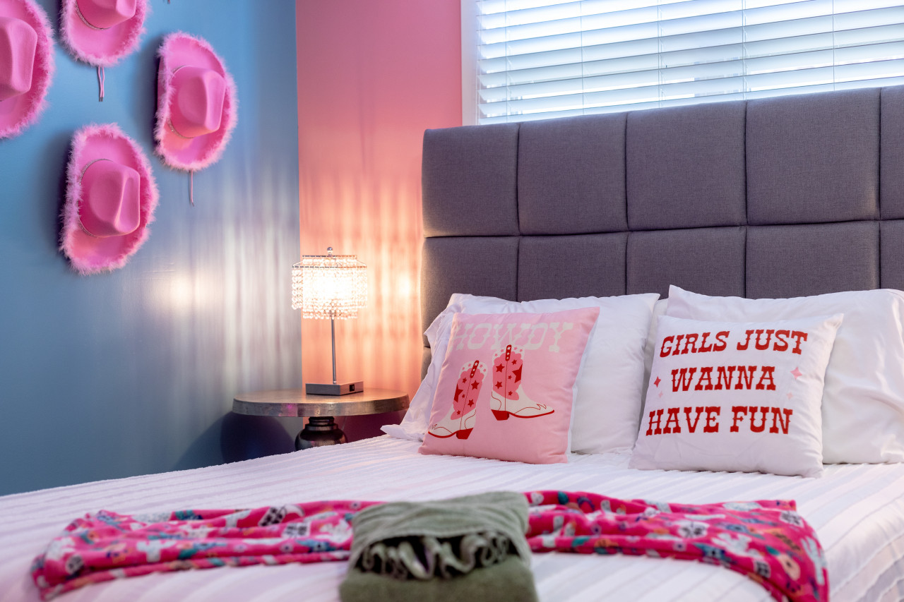 Queen Bed with Cute Decor around the walls!