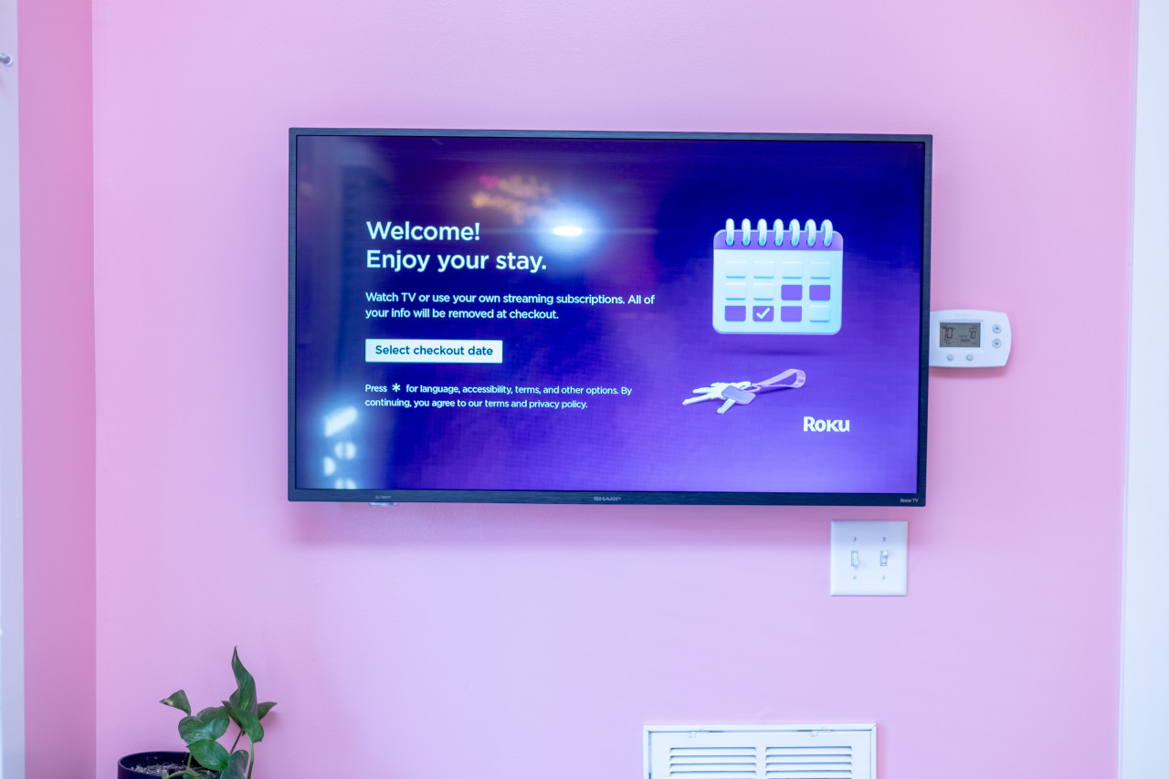 Stream your favorite movies and TV Shows on the Smart TV in the Master Bedroom