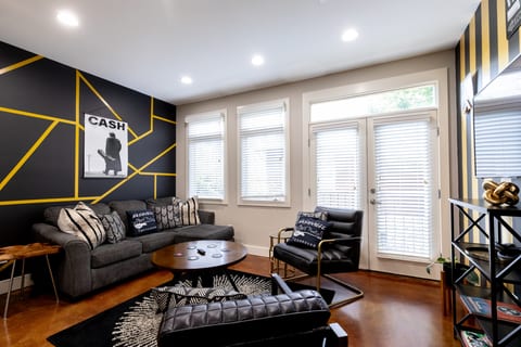 Spacious Living Room with Smart TV and Board Games