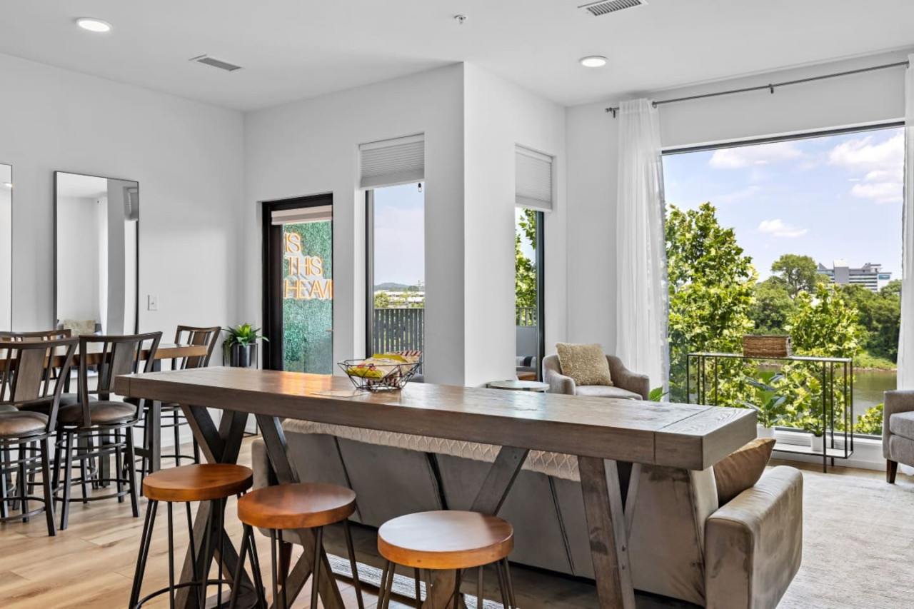Dining Area with Barstools and Dining Table
