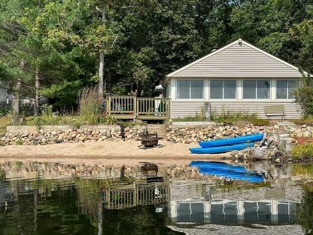An amazing view of the home from the lake.