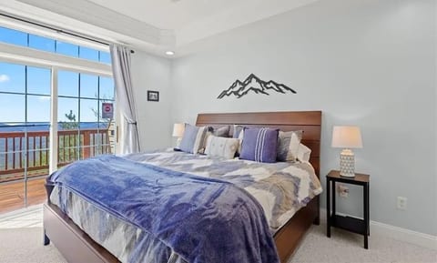 Primary bedroom with king bed and ensuite